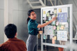canvas print picture - asian ux developer and ui designer presenting mobile app interface design on whiteboard in meeting at modern office.Creative digital development mobile app agency.digital transformation