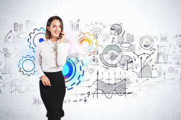 Wall Mural - Smiling woman on phone, business plan sketch