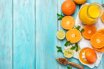 Wall Mural - Making Refreshing Orange Juice. Border Background, Top View over Ingredients