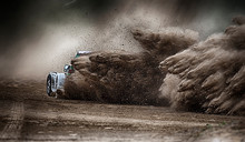 Racing Sports Car In Dust Clubs On The Track , Rally