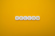 © JOE - Alphabet YELLOW word block with YELLOW background.