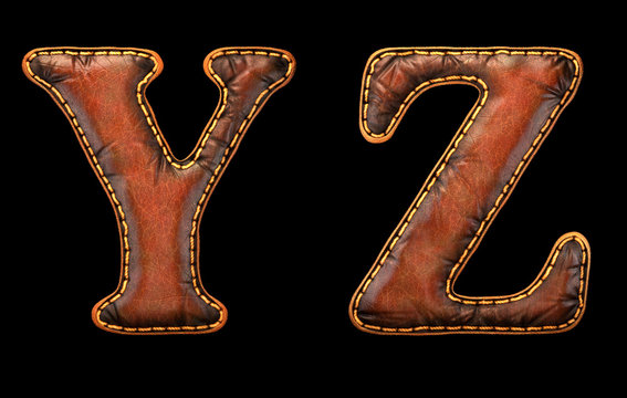 Set of leather letters Y, Z uppercase. 3D render font with skin texture isolated on black background.