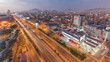 © neiezhmakov - Aerial view of Via Expresa highway and metropolitan bus with traffic day to night timelapse. Lima, Peru