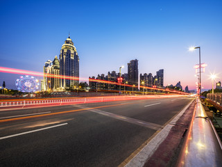 Poster - Night background of traffic road and modern city 