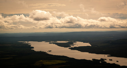 Wall Mural - panoramic overview over a valley with forest and lakes in sweden on a cloudy day
