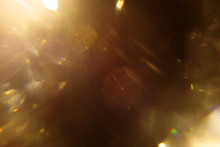 Easy To Add Lens Flare Effects For Overlay Designs Or Screen Blending Mode To Make High-quality Images. Abstract Sun Burst, Digital Flare, Iridescent Glare Over Black Background. Defocused Bokeh.