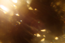 Easy To Add Lens Flare Effects For Overlay Designs Or Screen Blending Mode To Make High-quality Images. Abstract Sun Burst, Digital Flare, Iridescent Glare Over Black Background. Defocused Bokeh.