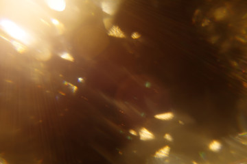 Fototapete - Easy to add lens flare effects for overlay designs or screen blending mode to make high-quality images. Abstract sun burst, digital flare, iridescent glare over black background. Defocused bokeh.
