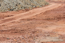 Red Dirt Road And Gravel Closeup