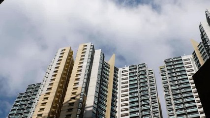 Sticker -  residential apartment building time lapse of cloud sky