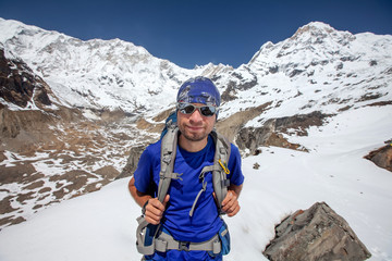 Wall Mural - hiker enjoys the view in the himalayan mountains