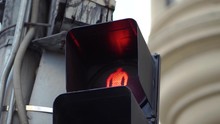 Red Man Flashing At Traffic Lights