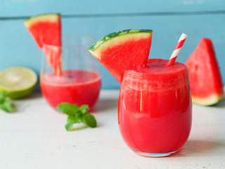 Wall Mural - Watermelon smoothies topping with fresh watermelon for summer drinks concept.