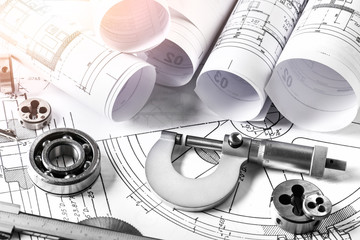 Wall Mural - Technical drawings with measure tools. Pencil, measurement. Papers with technical drawings and diagrams on the table...C