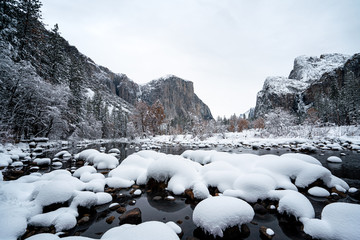 Wall Mural - view of river with mountains in background during winter