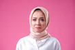 © Muhammad Anas - Isolated Pink background of Beauty asian women wearing scarf with variety reaction face