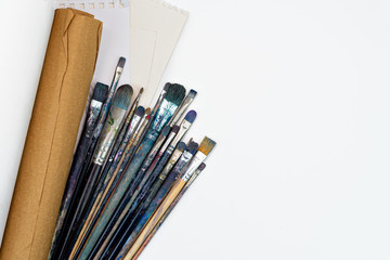 flat lay of Colorful paint brushes. Art concept. Painting process. Hobby to learn at home.