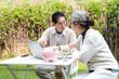 © 出 小 - Using a laptop to wear an Asian elderly couple