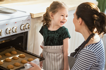 Happy family in the kitchen.