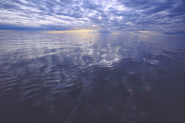 Wall Mural - sky above water / texture background, horizon sky with clouds on the lake