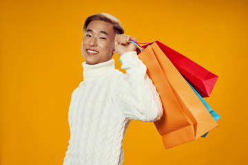 young man with shopping bags