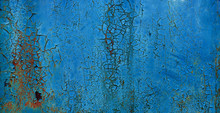 Blue Coroded Metal Sheet Background With Peeling Paint Flakes