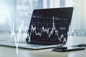 Multi exposure of abstract creative financial graph on modern computer background, forex and investment concept