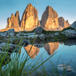 © Taiga - Mountains - Tre Cime di Lavaredo with real reflection in lake at sundown, Dolomites Alps
