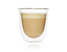 Transparent double wall glass mug with cappuccino coffee isolated