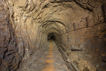 Underground abandoned bauxite ore mine tunnel