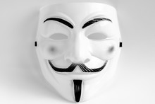 Close-up Of Mask Against White Background