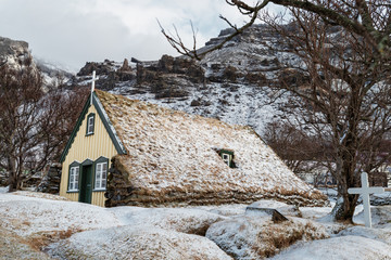 Wall Mural - Hofskirkja Church, Hof, Iceland. Traditional turf church built in 1884