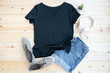 © photobuay - Black female t shirt mock up flat lay on wooden background. Top front view