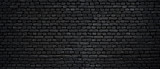 Fototapeta Desenie - Texture of a black painted brick wall as a background or wallpaper