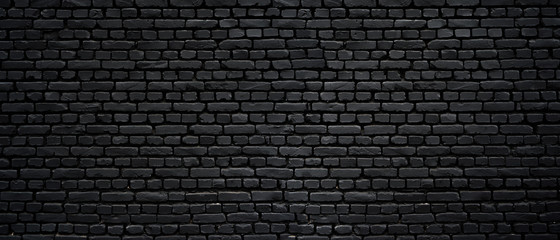 Wall Mural - texture of a black painted brick wall as a background or wallpaper