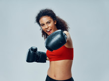 Young Woman With Boxing Gloves