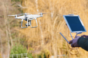 Wall Mural - drone quadcopter with digital camera flying