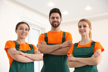 Canvas Print - Team of professional janitors indoors. Cleaning service