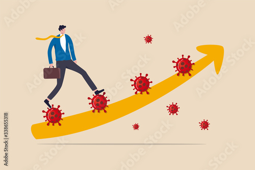 Fotografía Leadership to solve problem in Coronavirus COVID-19 crisis, walk pass and survive in economic crisis in COVID-19 outbreak, confidence business man leader walk up Coronavirus stair with graph arrow