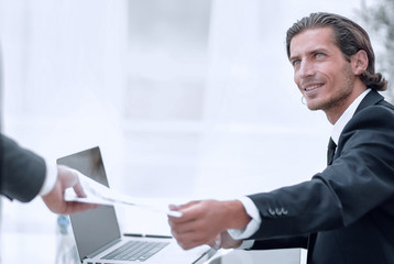 Canvas Print - employee gives the Manager the financial report