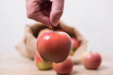  Male hand takes apples