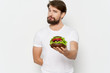 © SHOTPRIME STUDIO - young man holding a bowl of salad