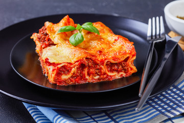 Wall Mural - Stuffed pasta manicotti with bolognese on a plate