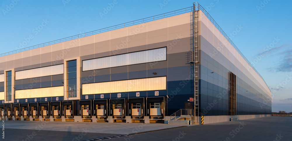building of a modern logistics center - obrazy, fototapety, plakaty 