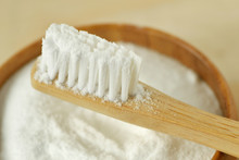 Close-up Of Baking Soda In A Bowl With A Wooden Toothbrush - Teeth Whitening