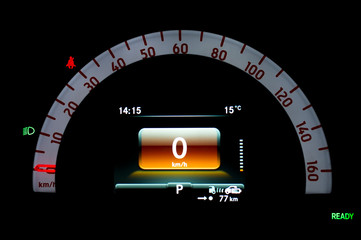 close up of illuminated circular speedometer in full electric vehicle. car cluster with analogue and