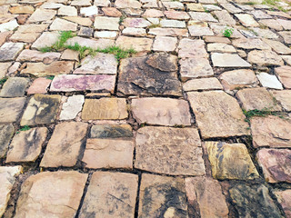 Detail of a stone wall with different size of rocks