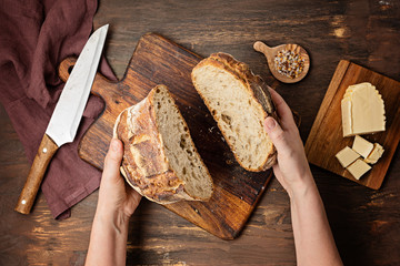 Wall Mural - Fresh organic artisan bread. Healthy eating, buy local, homemade bread recipes concept. Top view, flat lay