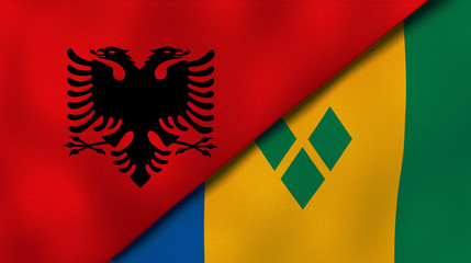 The flags of Albania and Saint Vincent and Grenadines. News, reportage, business background. 3d illustration