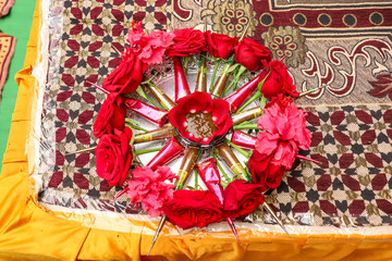 Wall Mural - indian wedding ceremony : mehandi con decorate in plate for mehandi ceremony